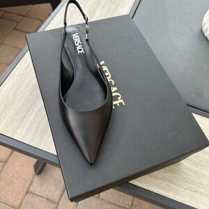 Versace flat sandals size 8.5.